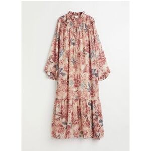 Pink Floral maxi dress with ruffle details long sleeves and a flowy silhouette